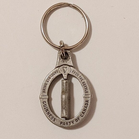 PEWTER GUINNESS STOUT Bottle Keychain SPINNER SPINNING MIDDLE Bottle Made in CAN - Picture 1 of 3
